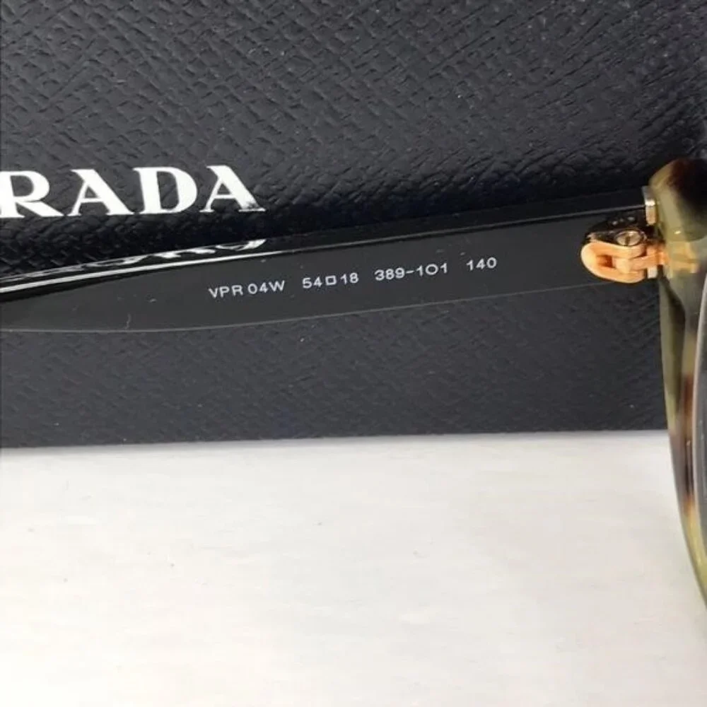 Authentic New PRADAPR 04WV black and medium havana